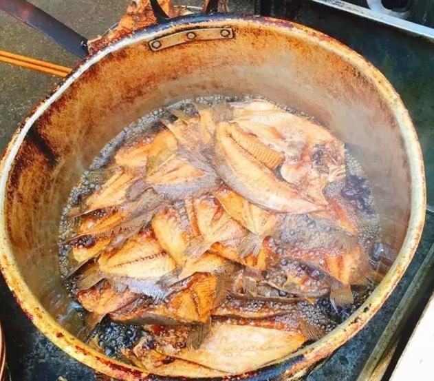 老鼠仔美食店老板,外号老鼠仔