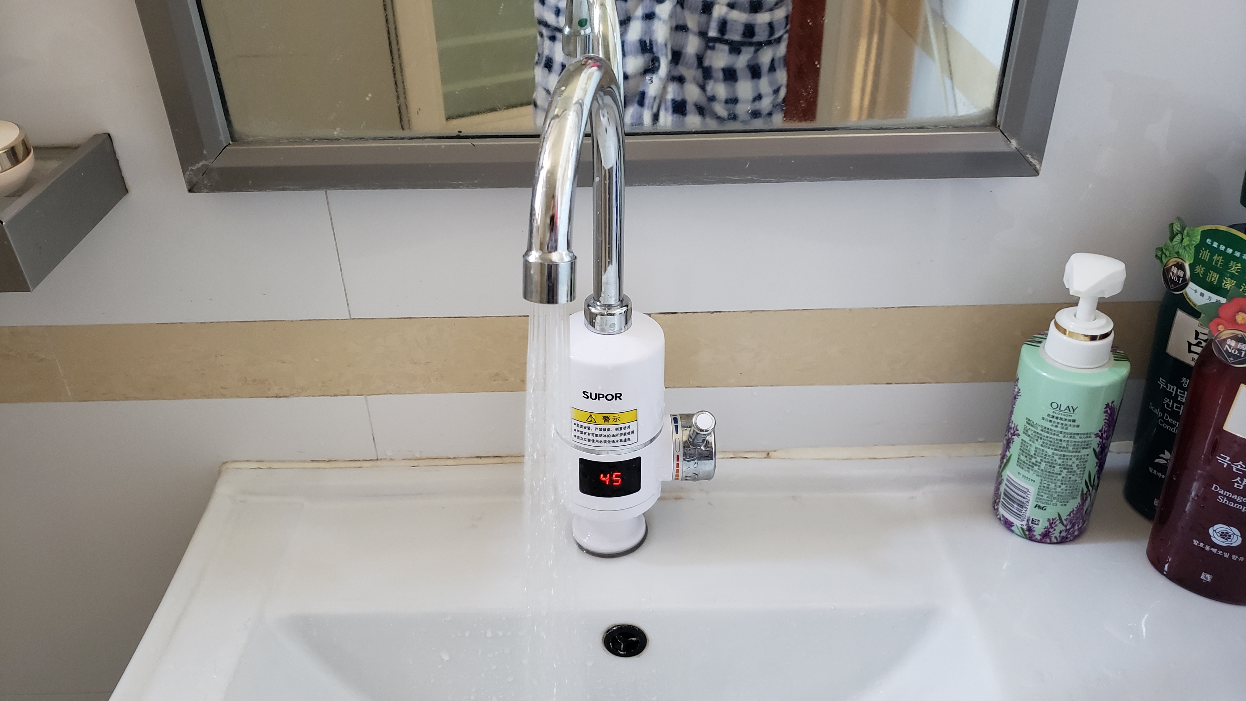 家里没装回水管怎么选热水器,家装如何实现一开龙头就出热水