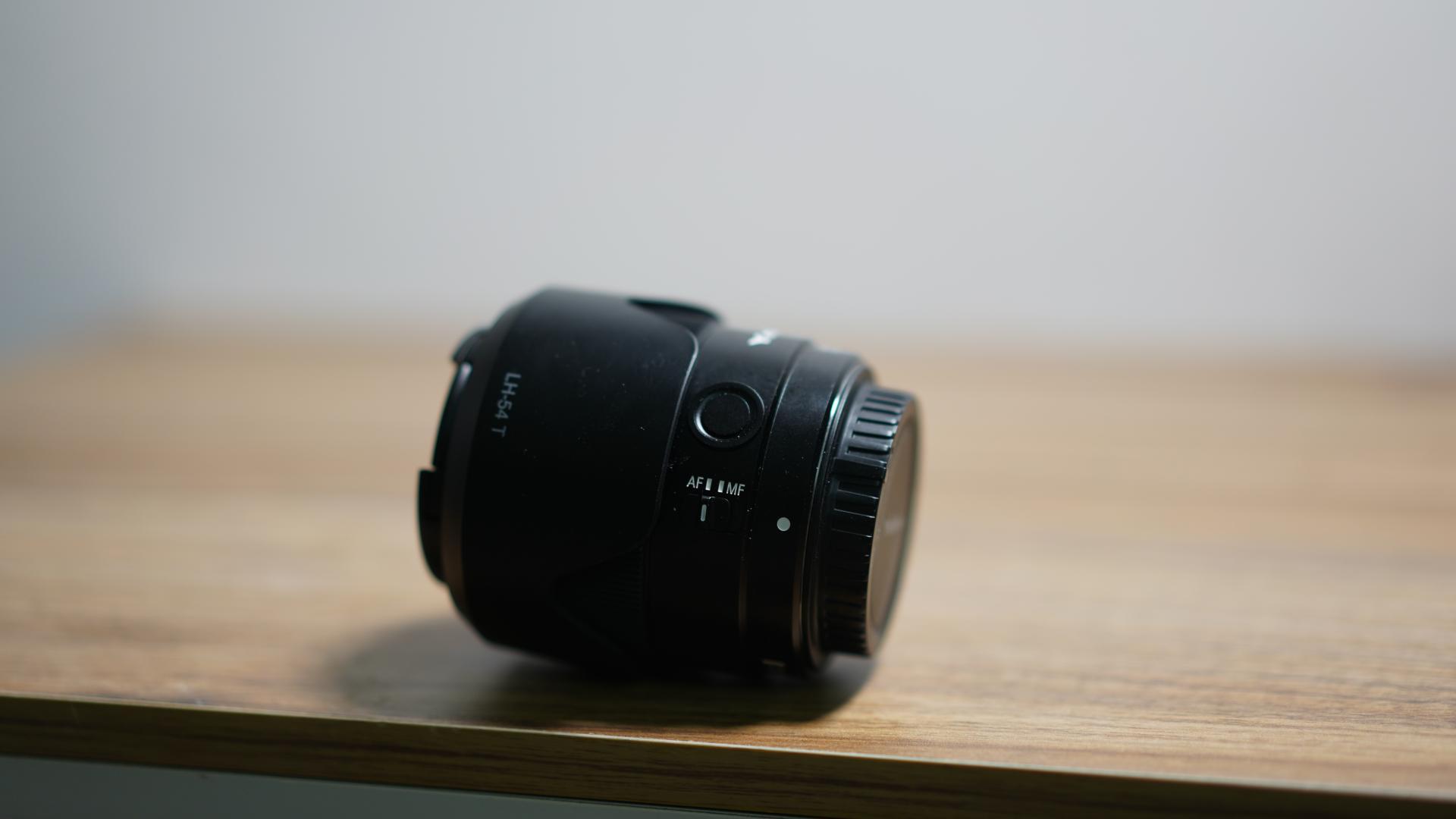 永诺yn35mmf2标准定焦镜头测评,永诺35mmf2和适马35f2对比