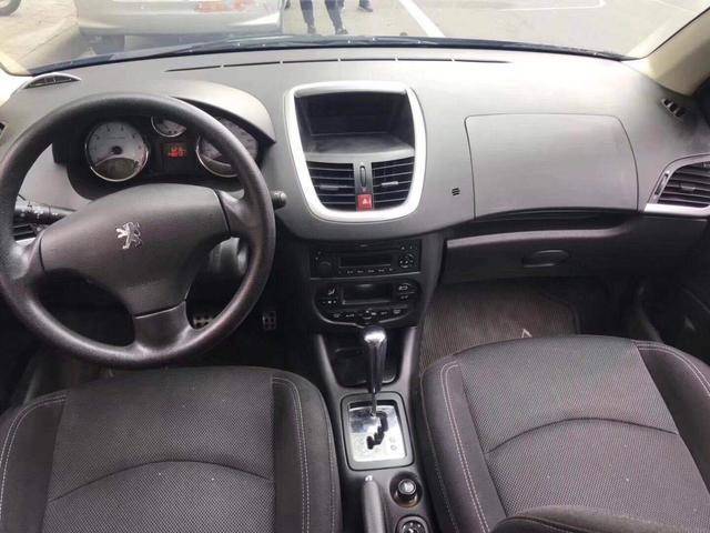 10年标致207自动挡两厢值多少钱,10年三厢自动挡标致207测评