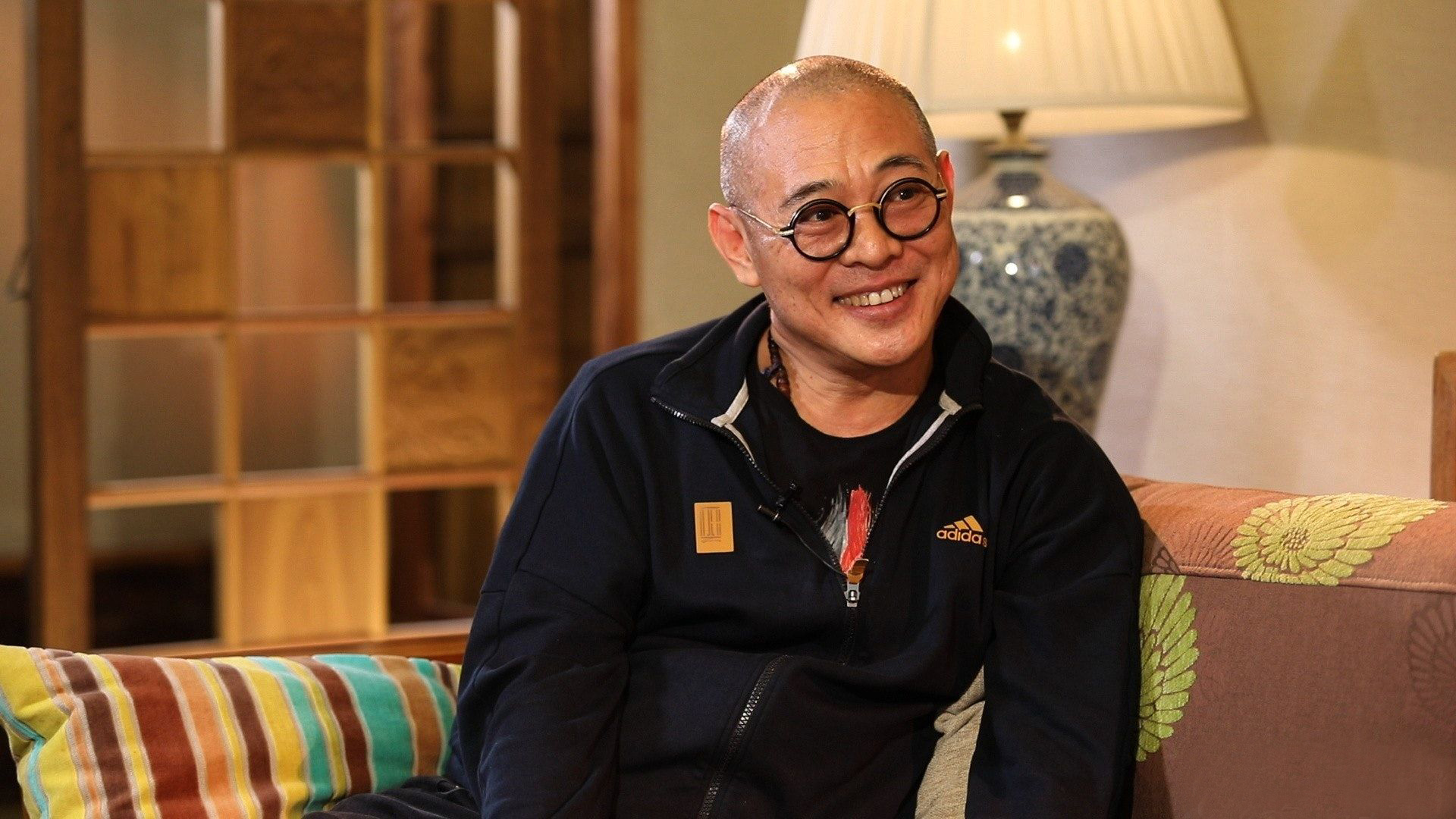 李连杰采访谈为利智还债,李连杰采访替利智还债