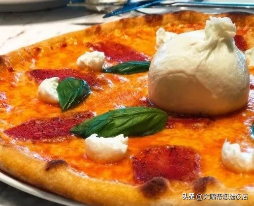 #吃遍大连#披萨的诱惑！一个蕴藏着芝士力量的神物
