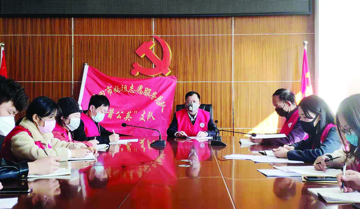 集结志愿,一抹志愿红温暖居民心