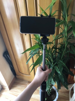 华为有线自拍杆的使用方法及操作,华为手机用自拍杆的使用方法图解