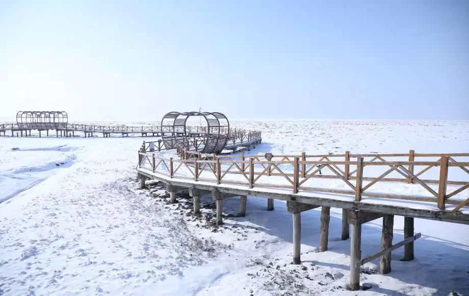 下雪后的海边图片大全,六月份的红海滩