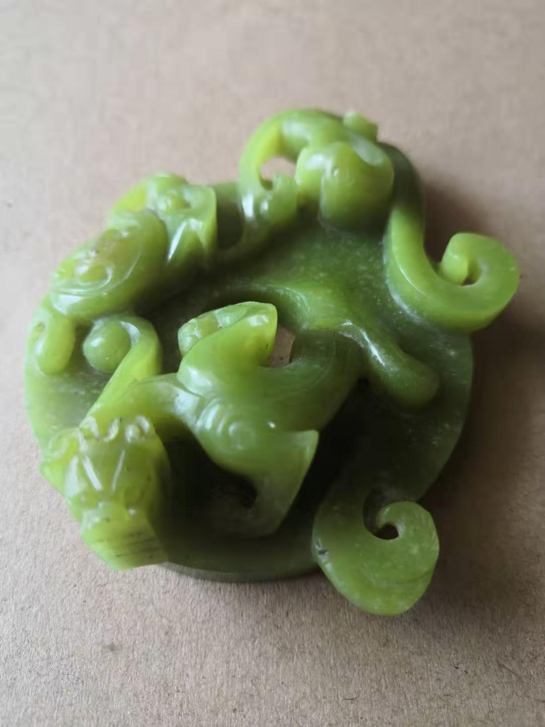 战国阴刻线龙凤纹玉璧图片,高古谷纹玉璧配饰图片