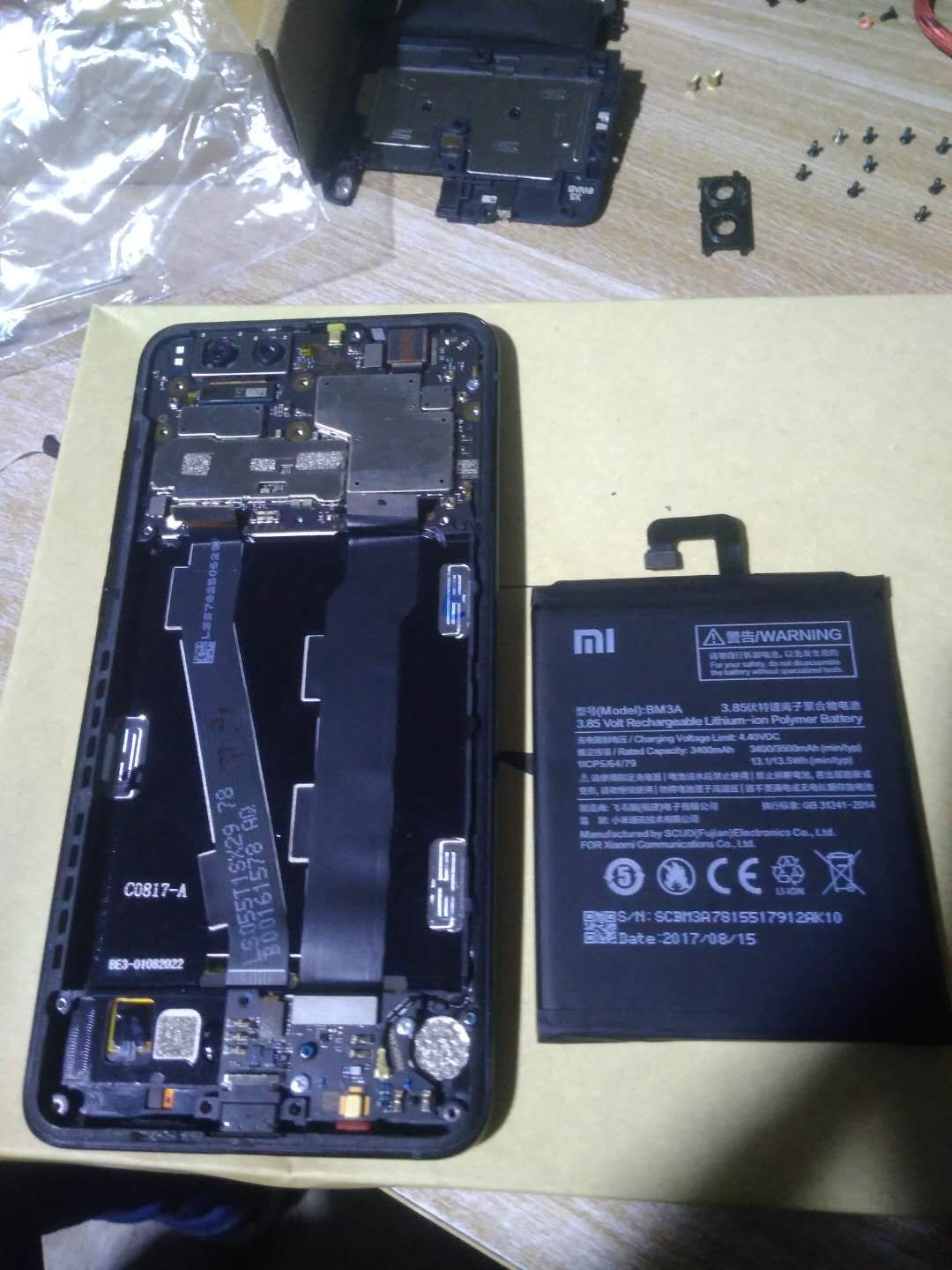 小米note3换完电池后自动重启,小米note3换电池教程品胜