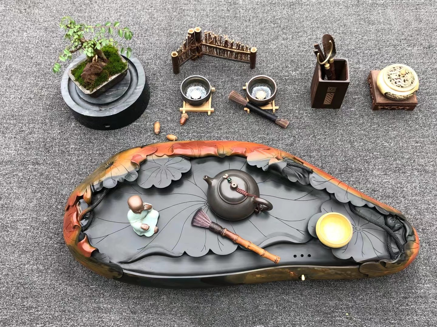 人工雕刻石茶盘,小伙子石头雕刻二十万