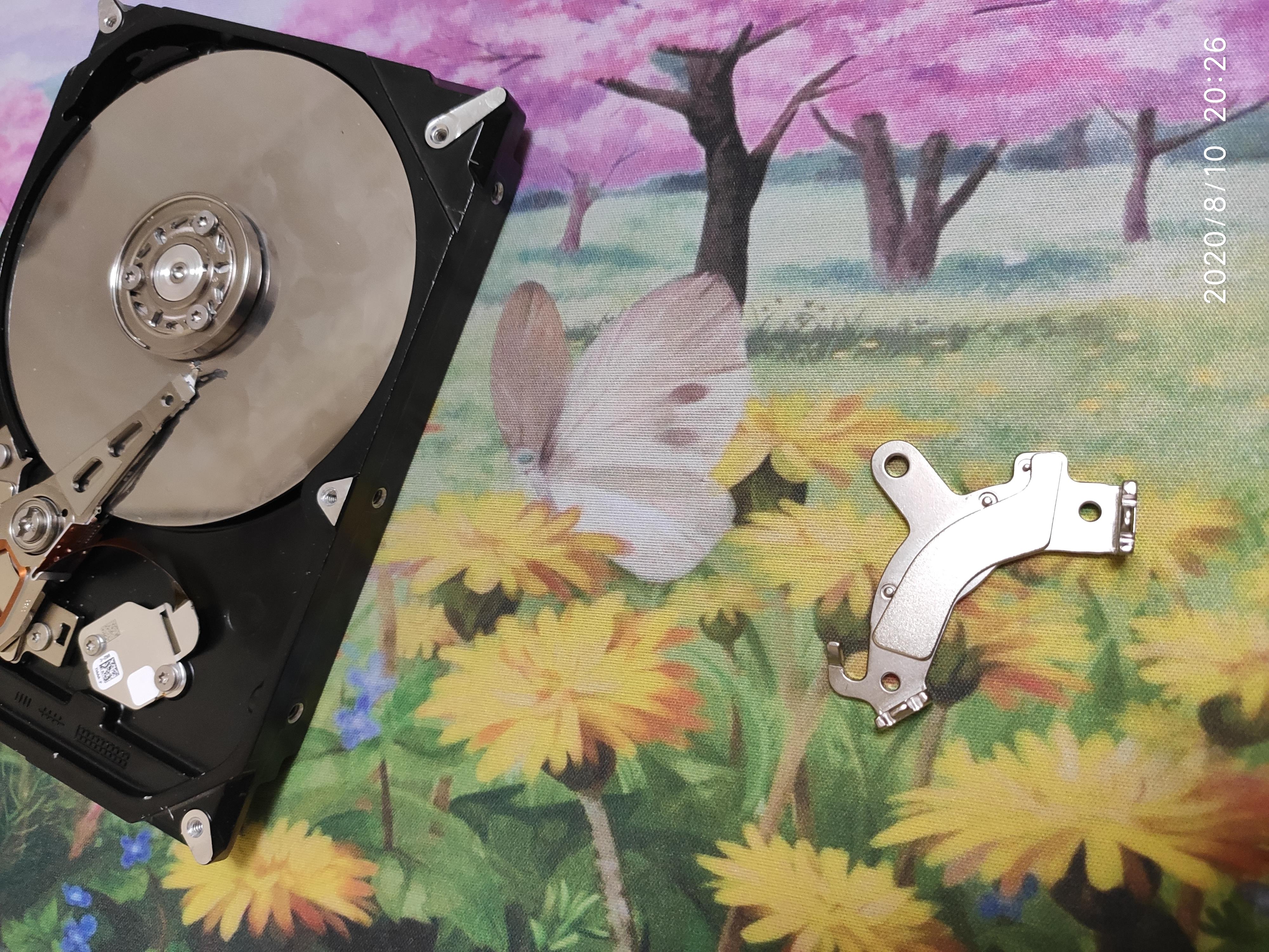 移动硬盘拆解做笔记本硬盘,电脑硬盘中的磁盘拆解