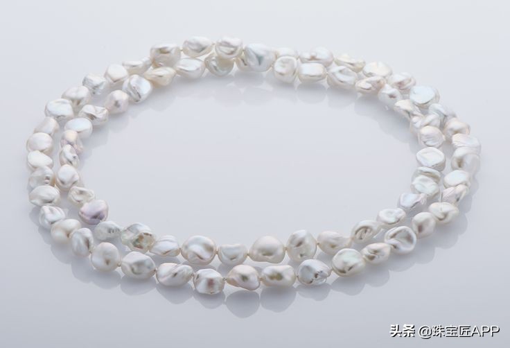 真正天然珍珠是怎样的,天然珍珠和仿制珍珠的区别