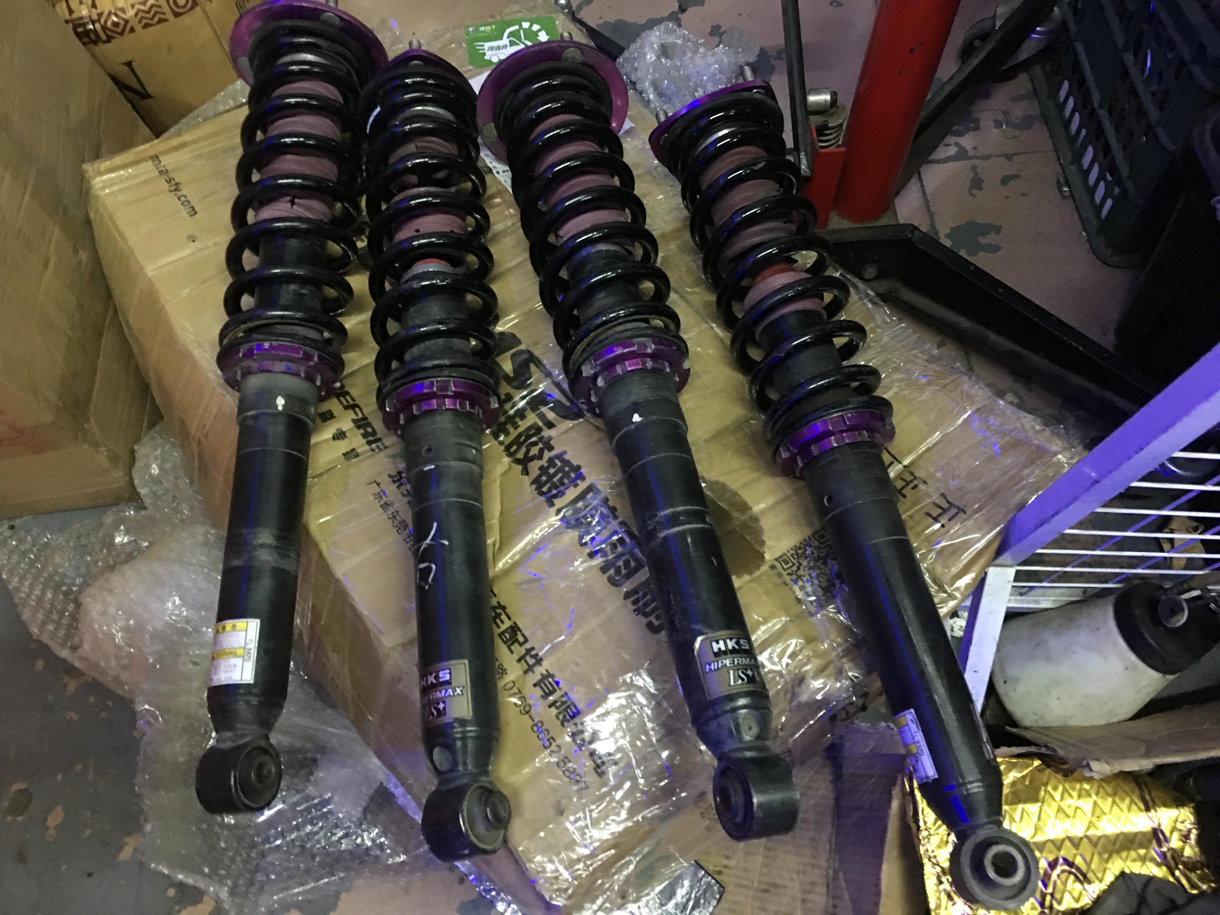 改装轮毂好还是改装绞牙避震好,绞牙避震漏油还能开吗