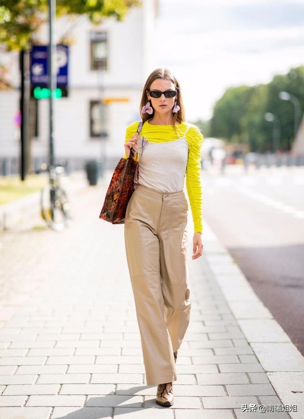 今年最流行的夏季裤口开叉小黑裤,黑色裤子今年最流行的哈伦裤