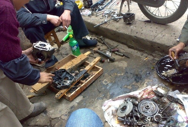 摩托车发动机积碳清洁剂,摩托车火花塞黑色积碳多怎么解决